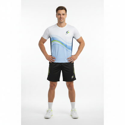 Full-body athlete wearing blue wave graphic tee and Swish Performance Badminton Shorts, square format