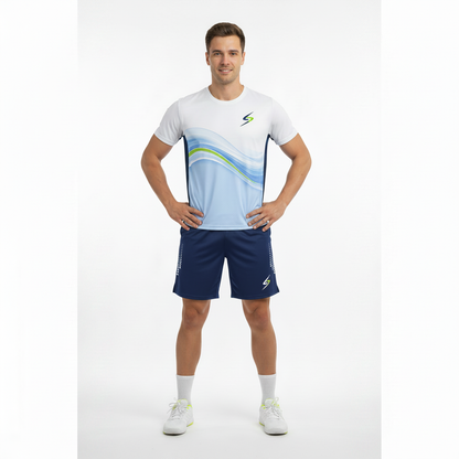 Full-body athlete wearing blue wave graphic tee and navy blue Swish Performance Badminton Shorts, square format